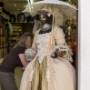 Venetian mask shop with a mannequin wearing a 18th century beautiful gown